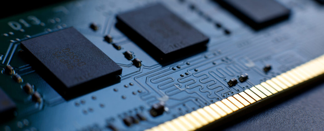RAM. Contacts, connecting tracks and microchips of a computer RAM Random Access Memory modules close-up for electronic design. Selective focus.
